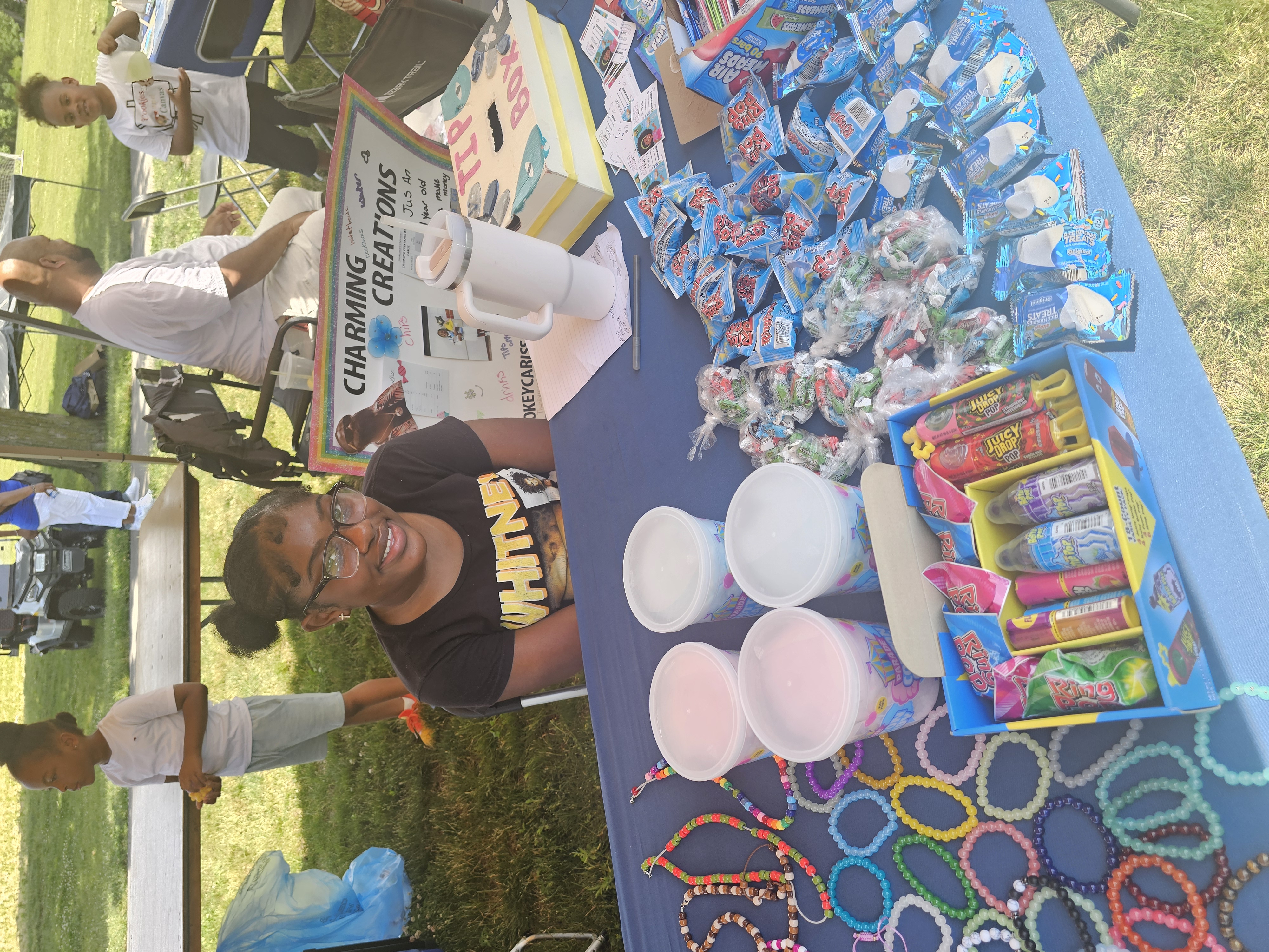Young entrepreneur selling products at a market